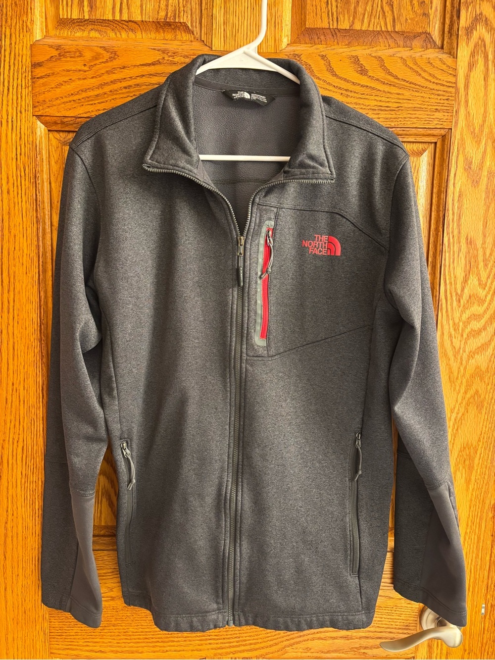 The North Face Men’s Dark Gray Softshell Jacket with Red Accents